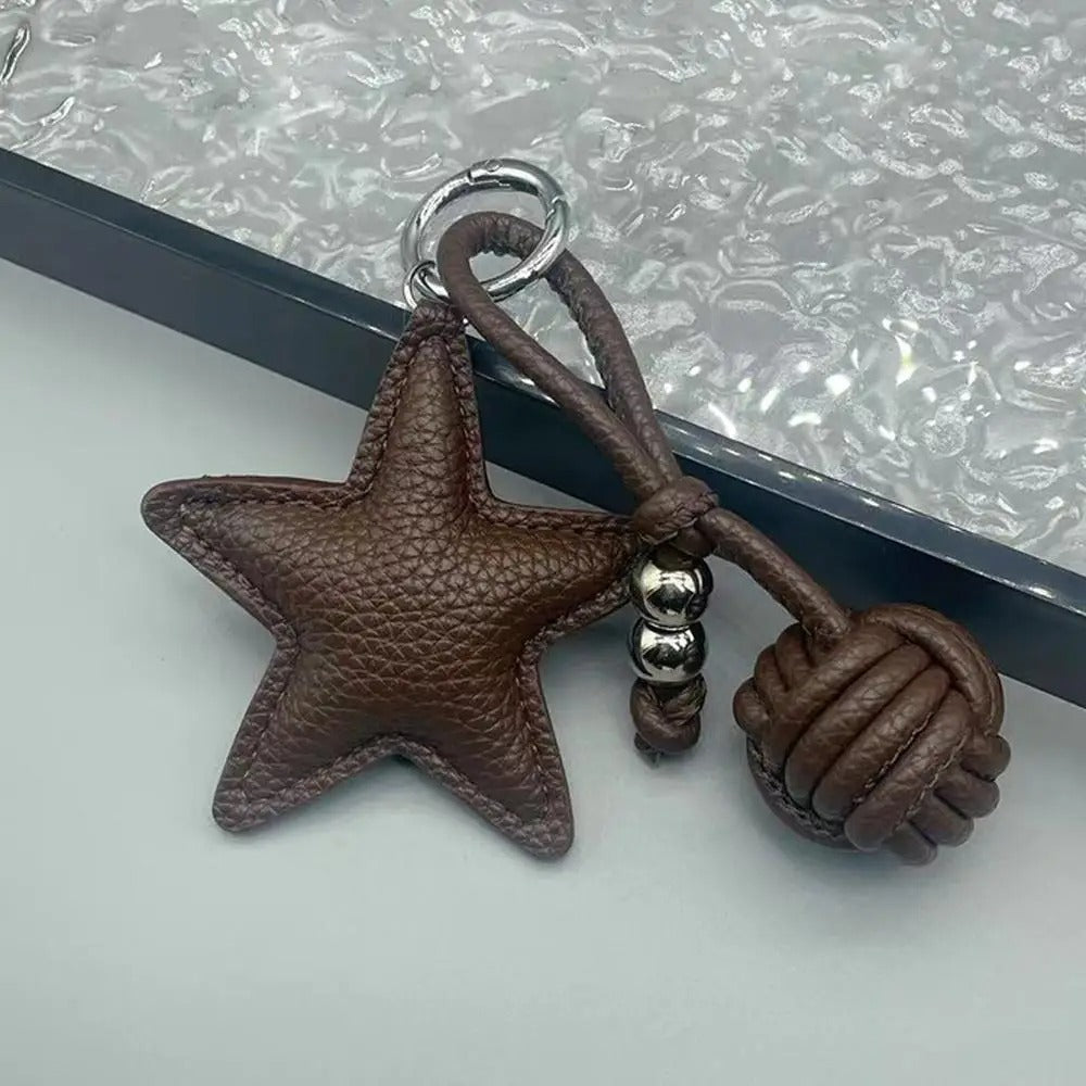 Charm Estrella y Bola de Cuero Sintético