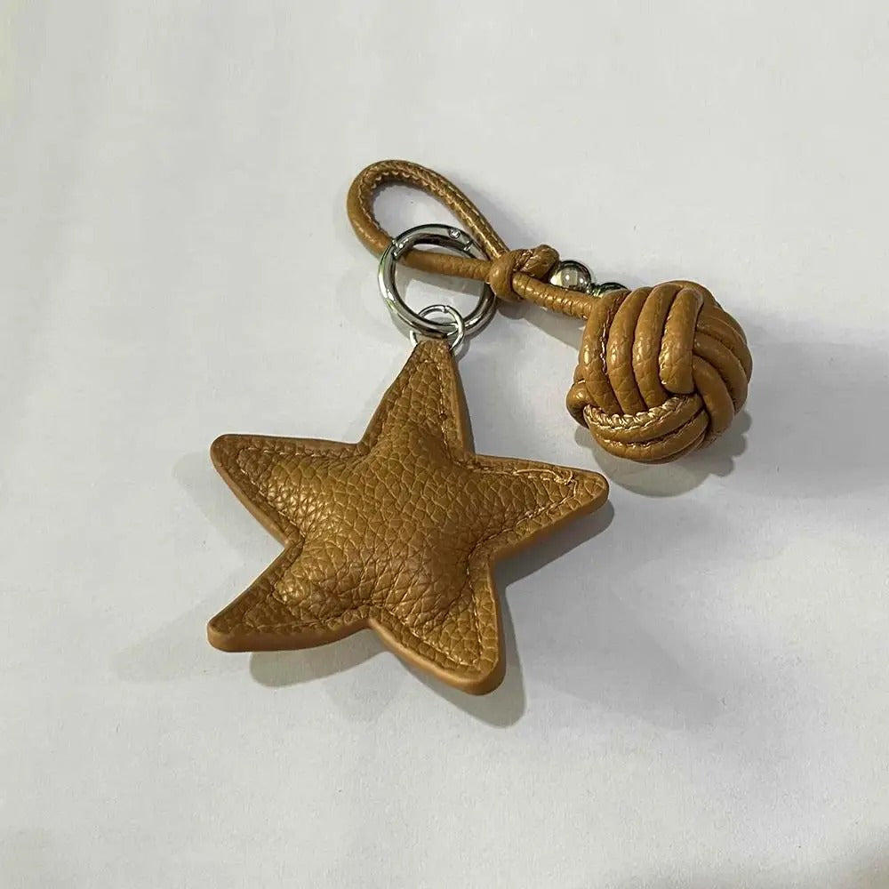 Charm Estrella y Bola de Cuero Sintético